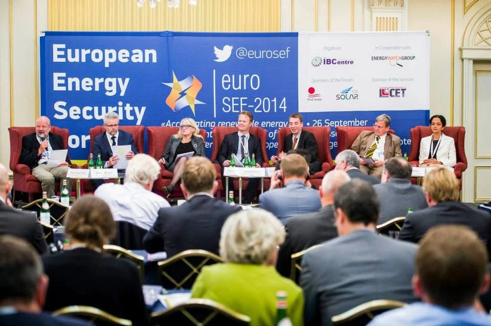 Seven panelists seated before an audience beneath the EuroSEF-2014 banner
